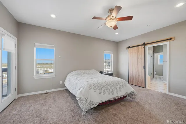 a room with gym equipment and a table