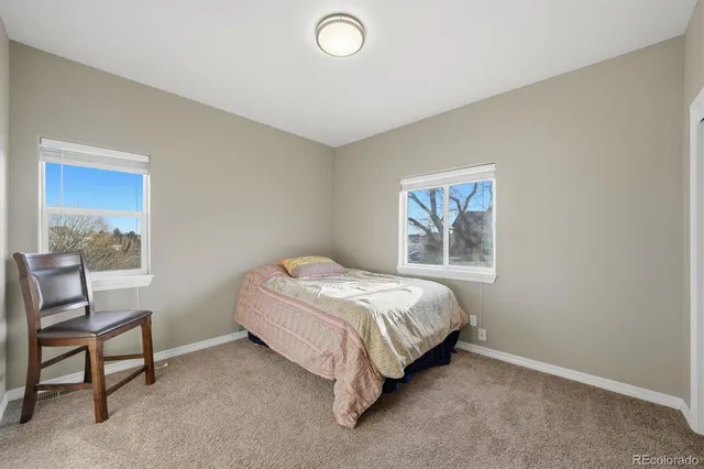 a view of empty room with wooden walls