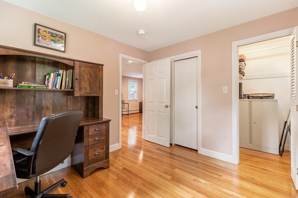 24 Oxbow Road Lexington, MA 02421 - Photo 11 of 28 a view of a workspace with furniture and wooden floor