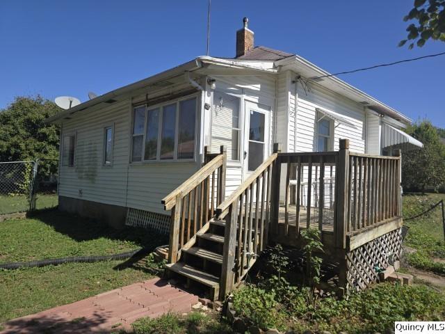 201 Laurel Street Elvaston, IL 62334 - Photo 13 of 17 a front view of a house with garden and deck