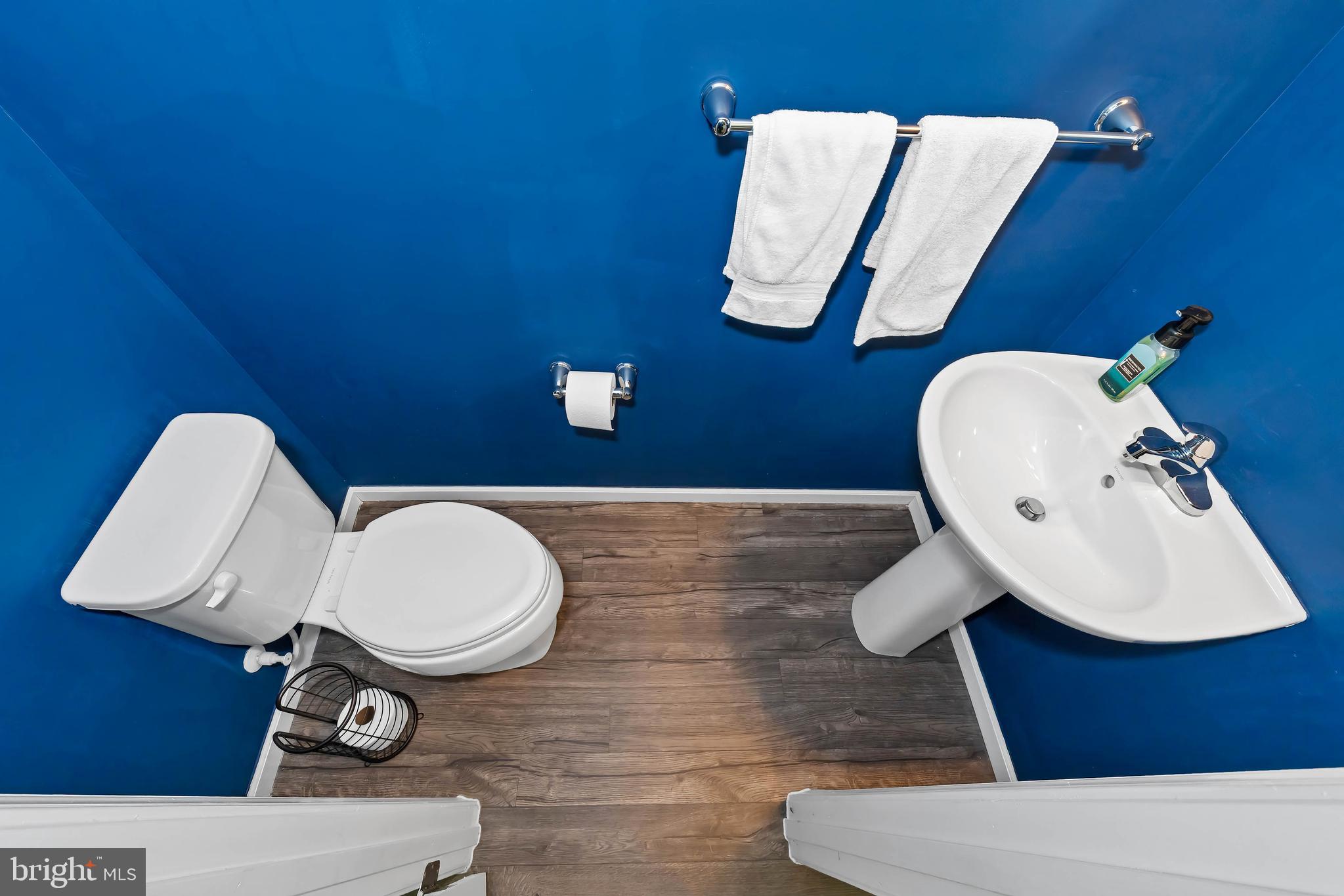 141 Wye Oak Drive Townsend, DE 19734 - Photo 13 of 32 a bathroom with a sink mirror and vanity
