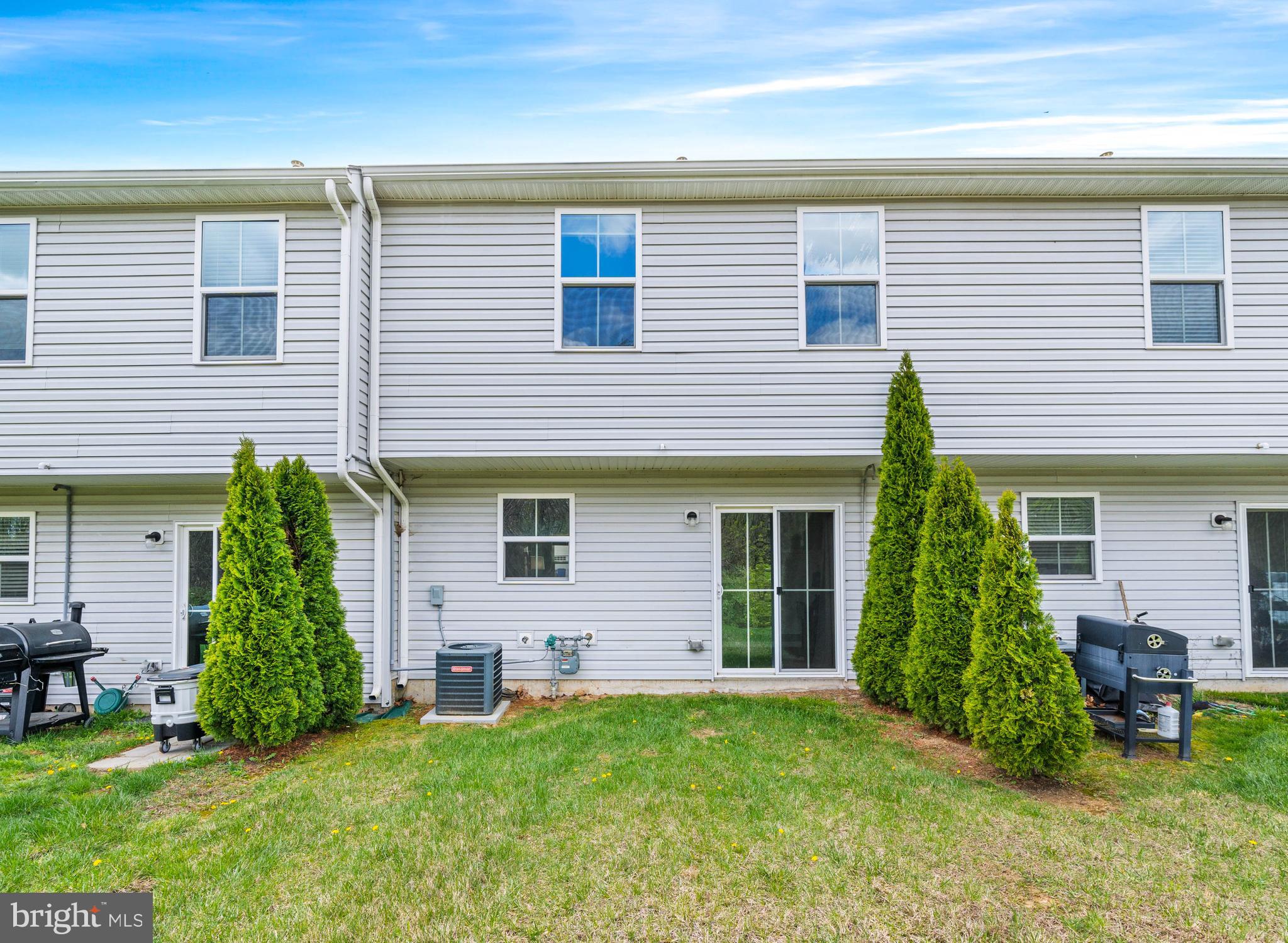 141 Wye Oak Drive Townsend, DE 19734 - Photo 15 of 32 a view of a house with a backyard