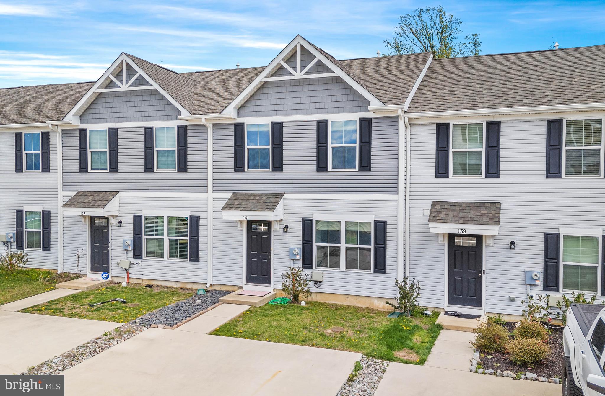 141 Wye Oak Drive Townsend, DE 19734 - Photo 2 of 32 front view of a house with a yard