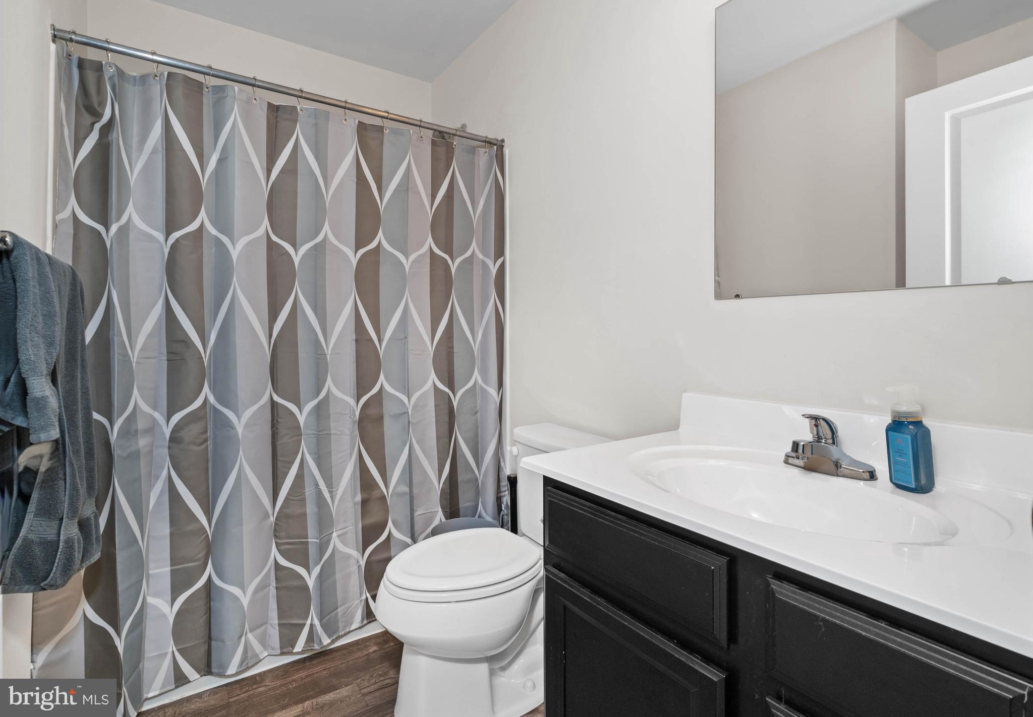 141 Wye Oak Drive Townsend, DE 19734 - Photo 26 of 32 a bathroom with a sink toilet and shower