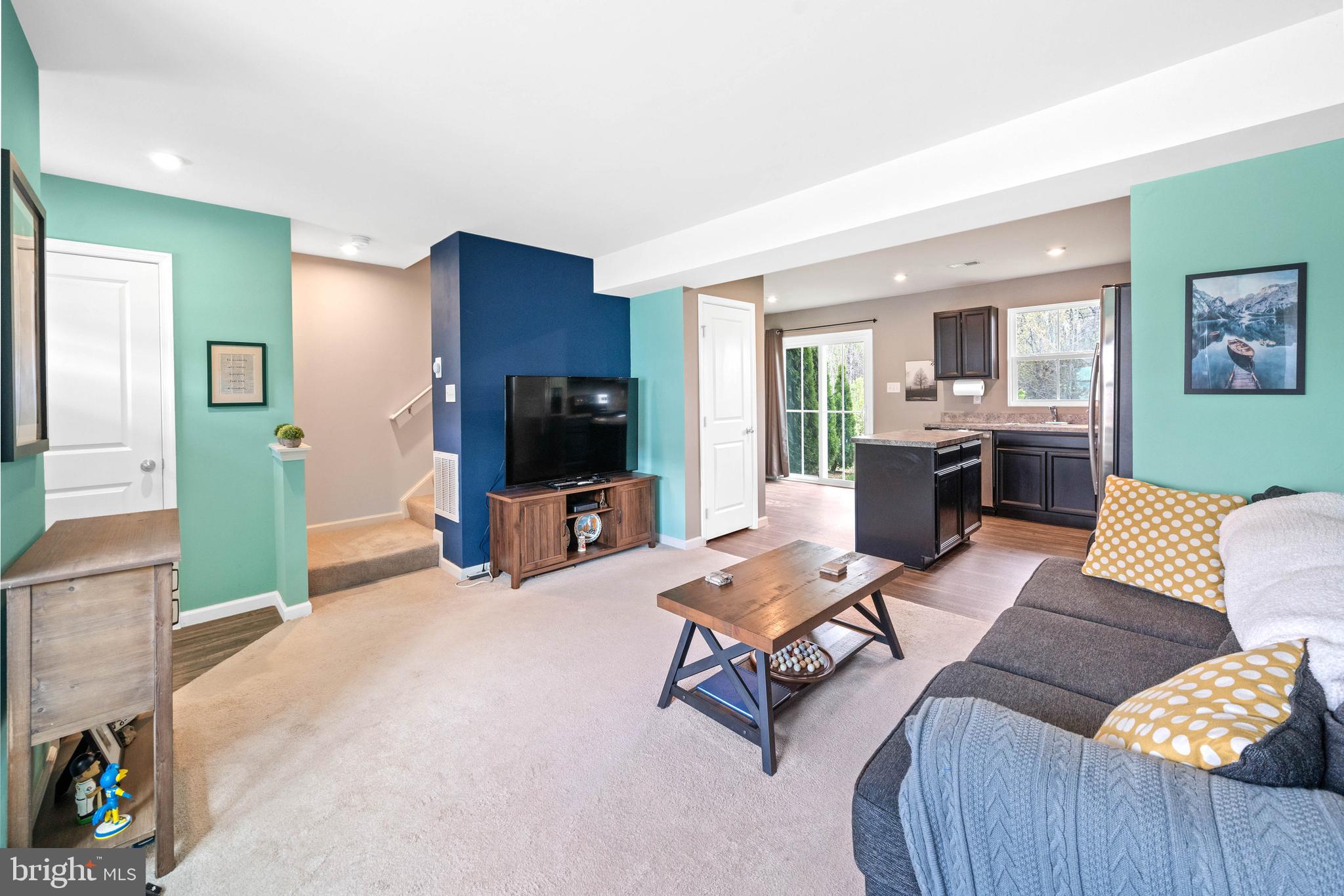 141 Wye Oak Drive Townsend, DE 19734 - Photo 4 of 32 a living room with furniture and a flat screen tv