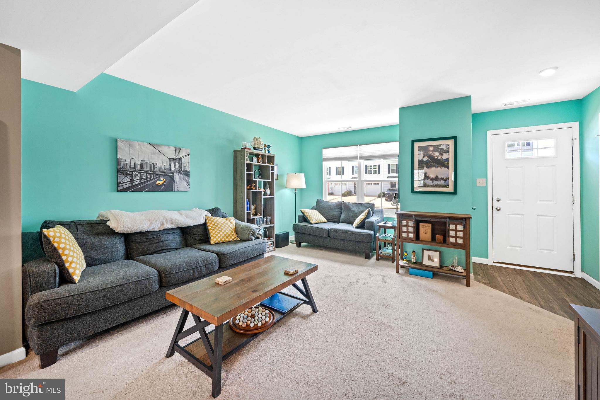 141 Wye Oak Drive Townsend, DE 19734 - Photo 6 of 32 a living room with furniture and a wooden floor