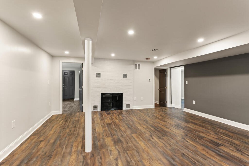 48 Pinewood Avenue Billerica, MA 01821 - Photo 11 of 26 a view of a big room with wooden floor and windows