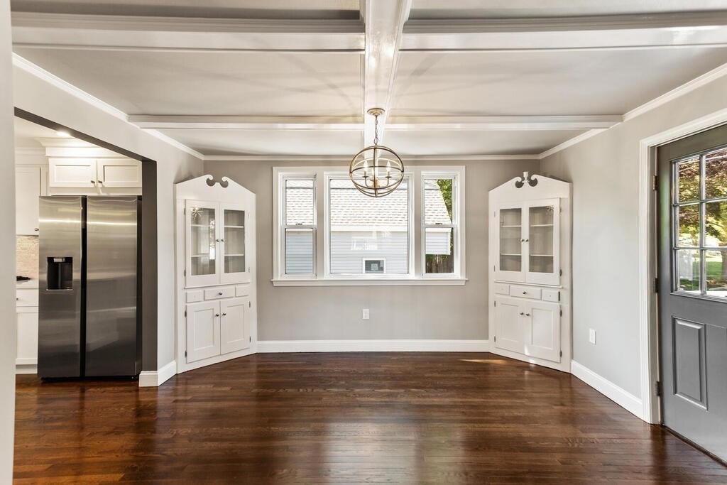 48 Pinewood Avenue Billerica, MA 01821 - Photo 15 of 26 a view of an entryway with wooden floor and door