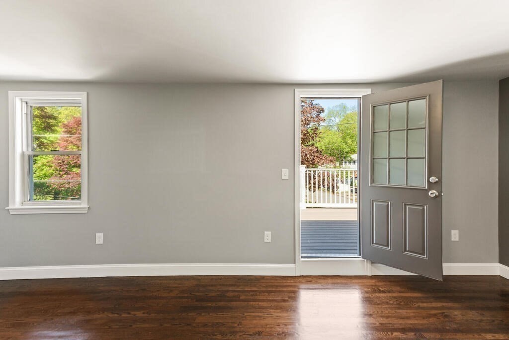 48 Pinewood Avenue Billerica, MA 01821 - Photo 19 of 26 a view of an empty room with wooden floor and a window