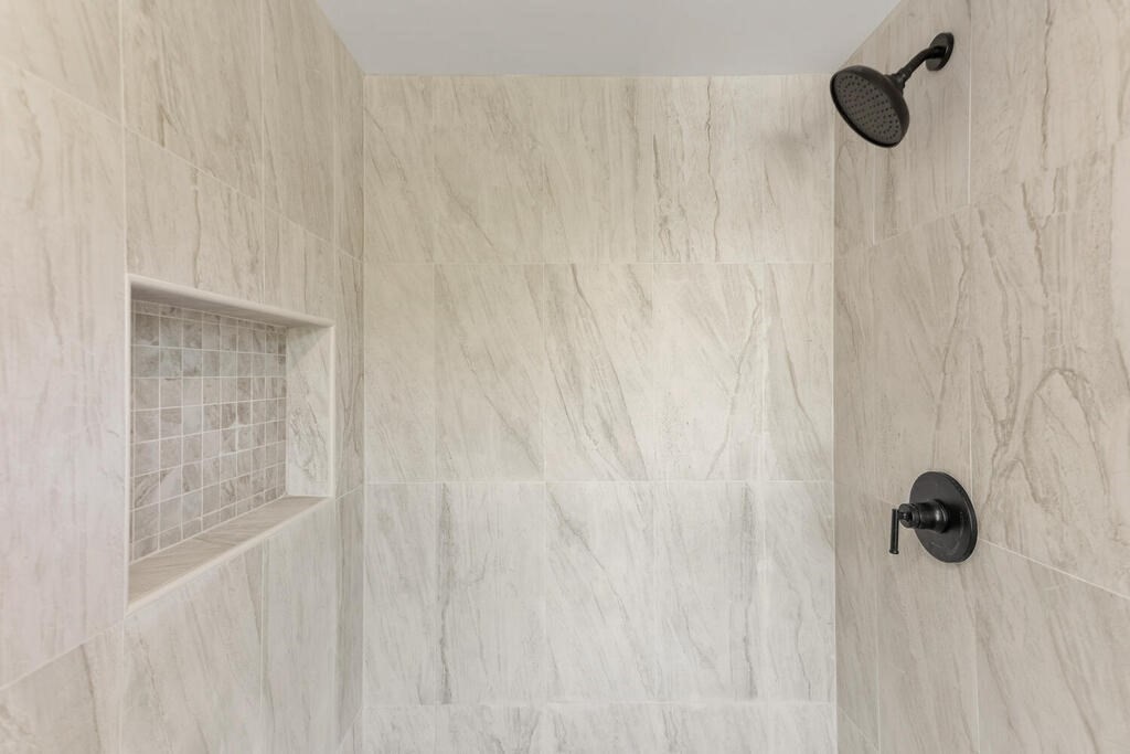 48 Pinewood Avenue Billerica, MA 01821 - Photo 23 of 26 a bathroom with a shower