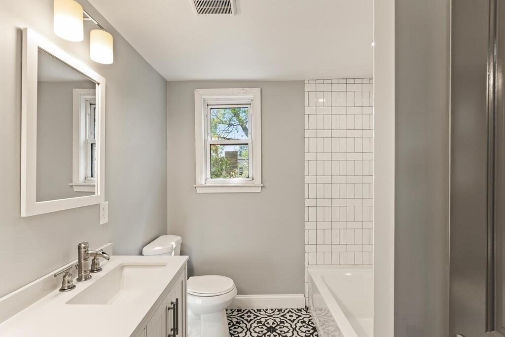 48 Pinewood Avenue Billerica, MA 01821 - Photo 24 of 26 a bathroom with a sink toilet and shower
