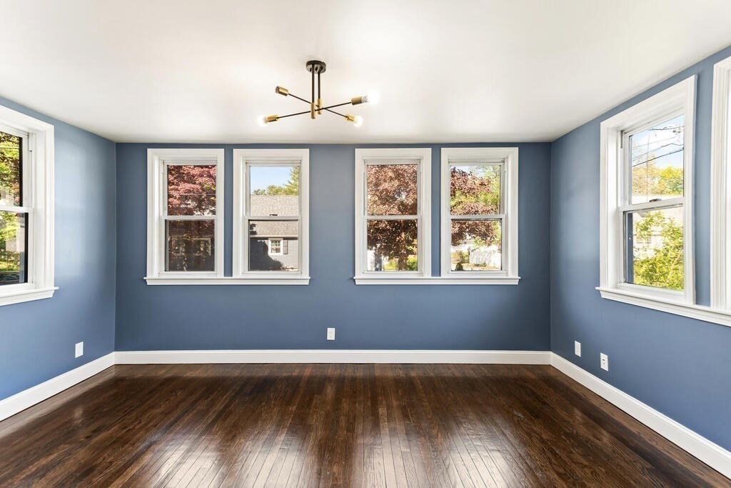 48 Pinewood Avenue Billerica, MA 01821 - Photo 26 of 26 a view of an empty room with wooden floor and a window