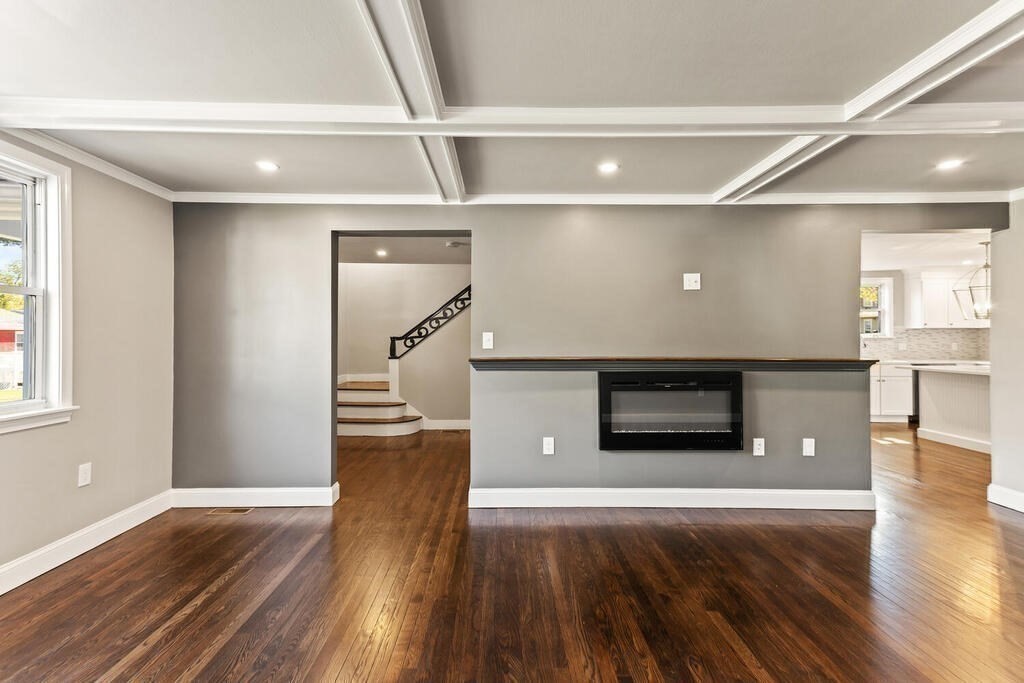 48 Pinewood Avenue Billerica, MA 01821 - Photo 10 of 26 a living room with stainless steel appliances kitchen island hardwood floor and living room view
