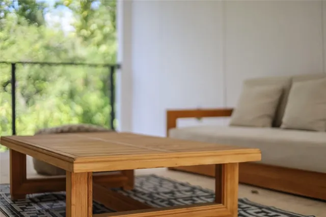 a view of storage and utility room with a bench in it