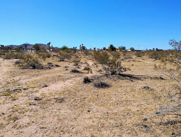 a view of ocean and mountain