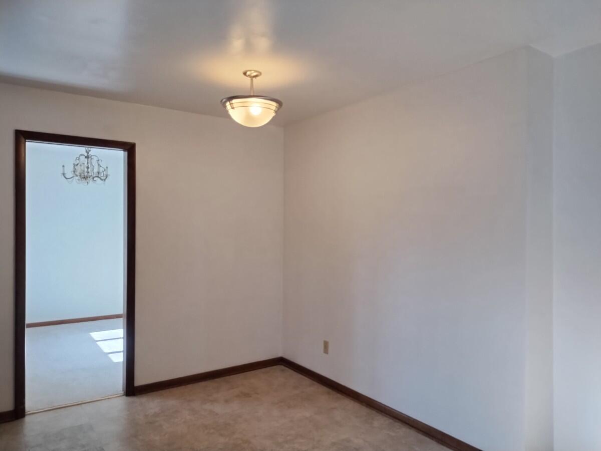 1040 Azalea Drive Munster, IN 46321 - Photo 7 of 16 an empty room with a hallway