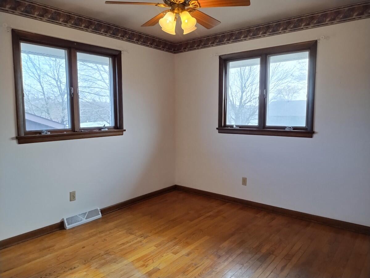 1040 Azalea Drive Munster, IN 46321 - Photo 10 of 16 an empty room with a window