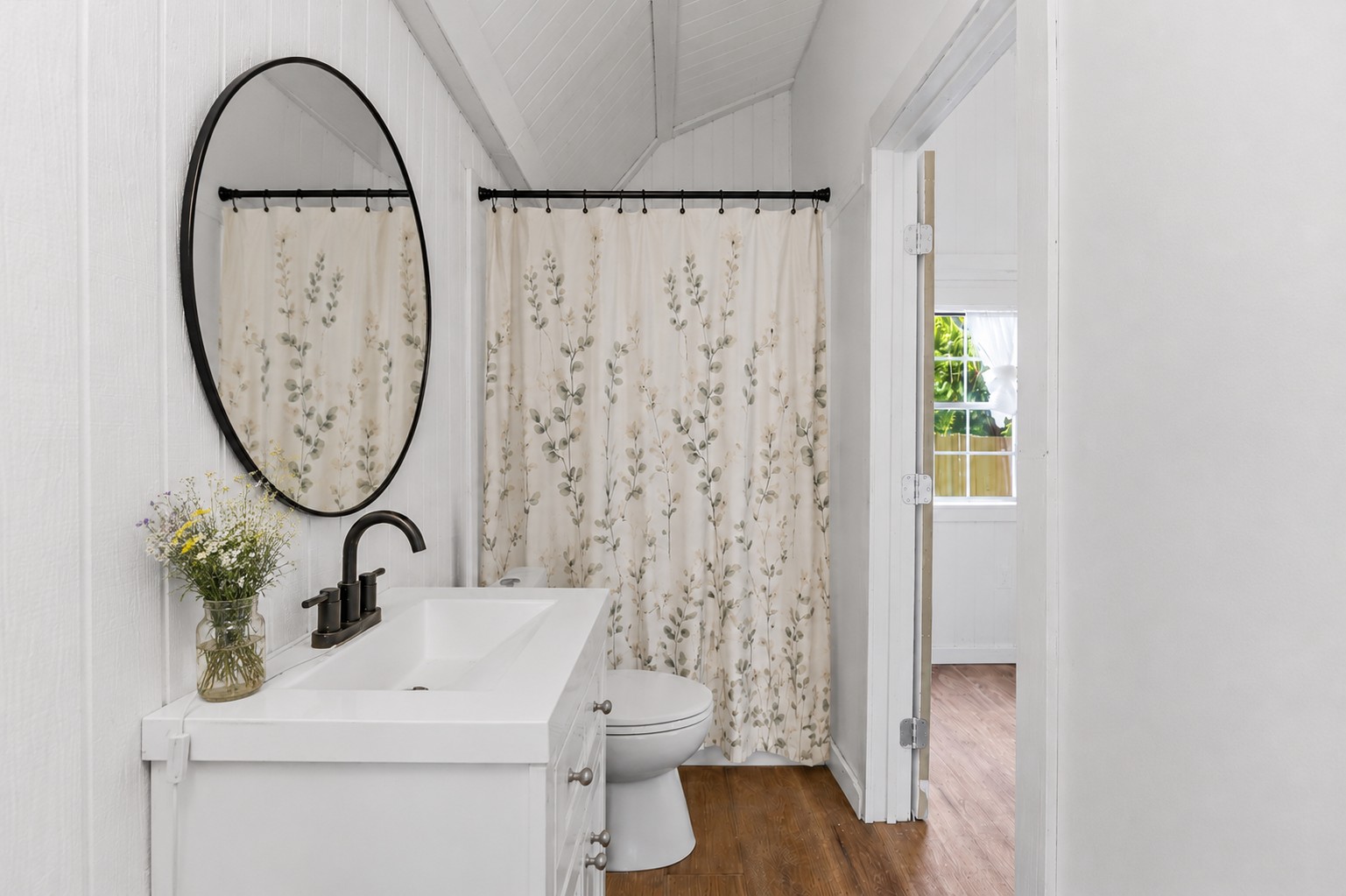 189 Watterson Road Bastrop, TX 78602 - Photo 13 of 22 Virtually enhanced picture (mirror, curtain and flowers added).