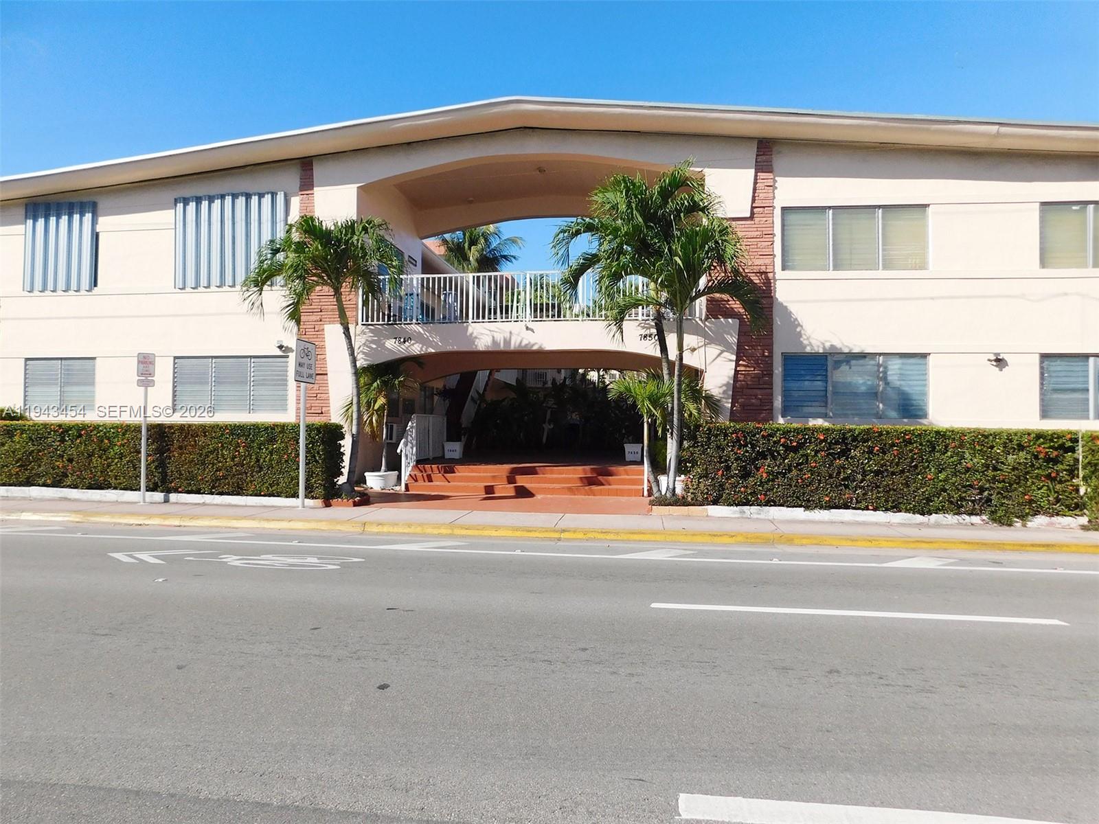 7840 Harding Avenue, Unit 2 Miami Beach, FL 33141 - Photo 1 of 19 front view of a house with a street