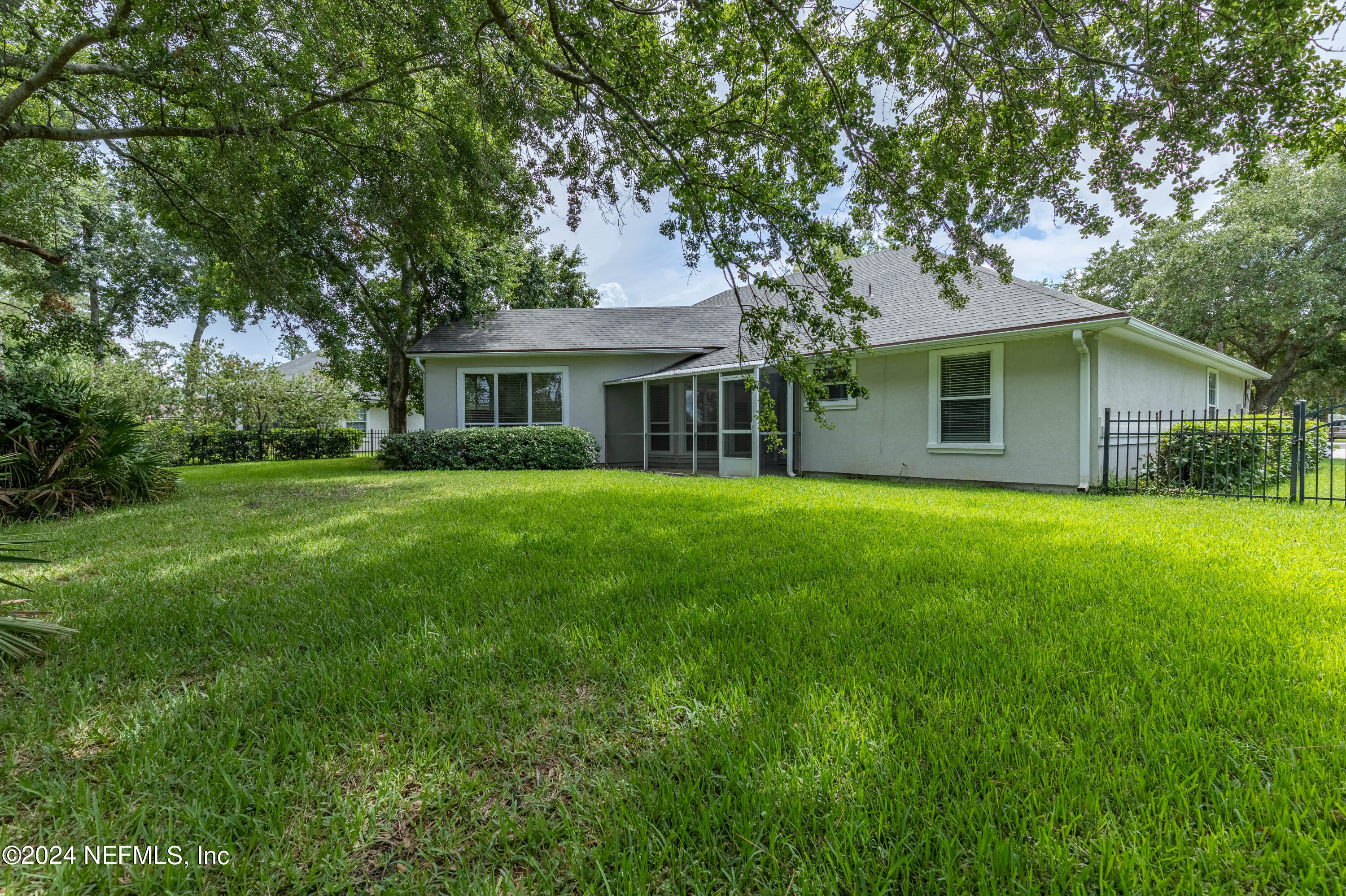 2285 Eagle Harbor Parkway Fleming Island, FL 32003 - Photo 22 of 59 a front view of house with yard and green space