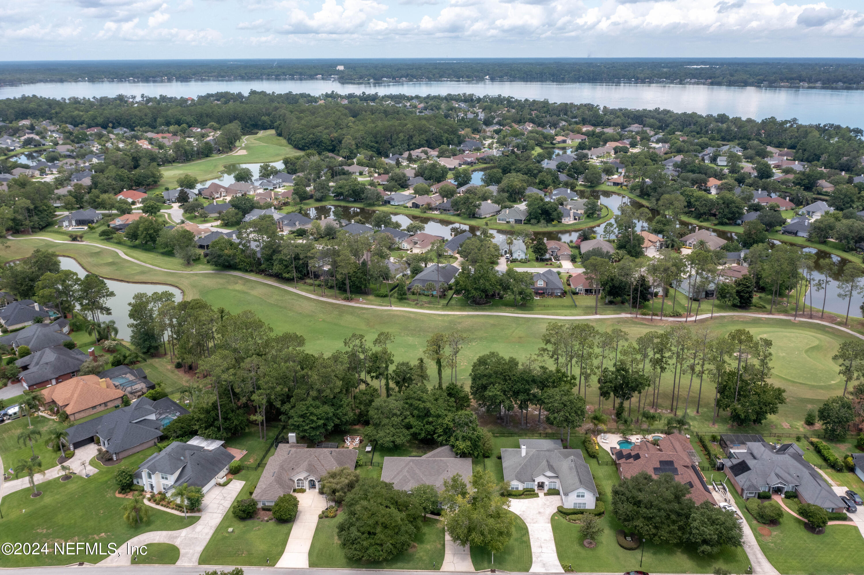 2285 Eagle Harbor Parkway Fleming Island, FL 32003 - Photo 26 of 59 an aerial view of a city with lots of residential buildings