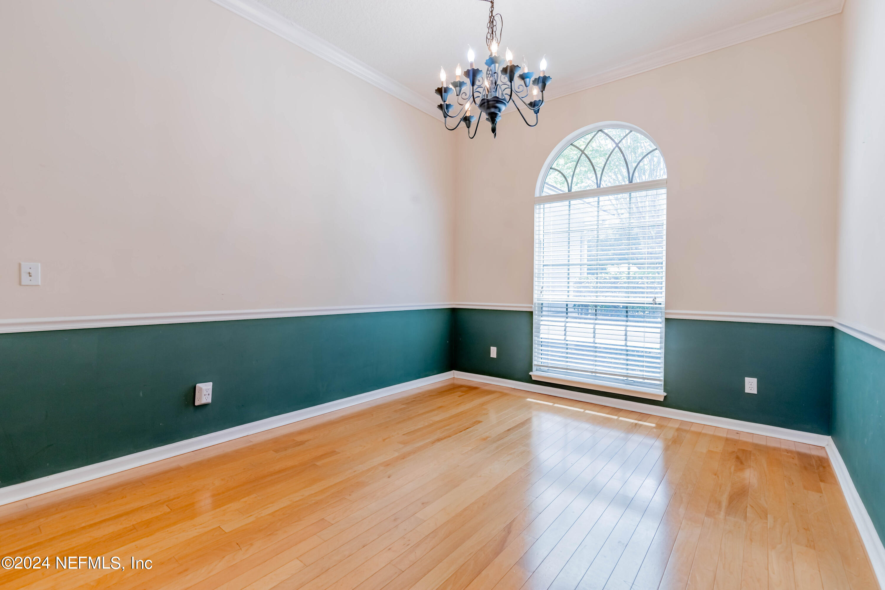 2285 Eagle Harbor Parkway Fleming Island, FL 32003 - Photo 33 of 59 a view of an empty room with a window and cabinet