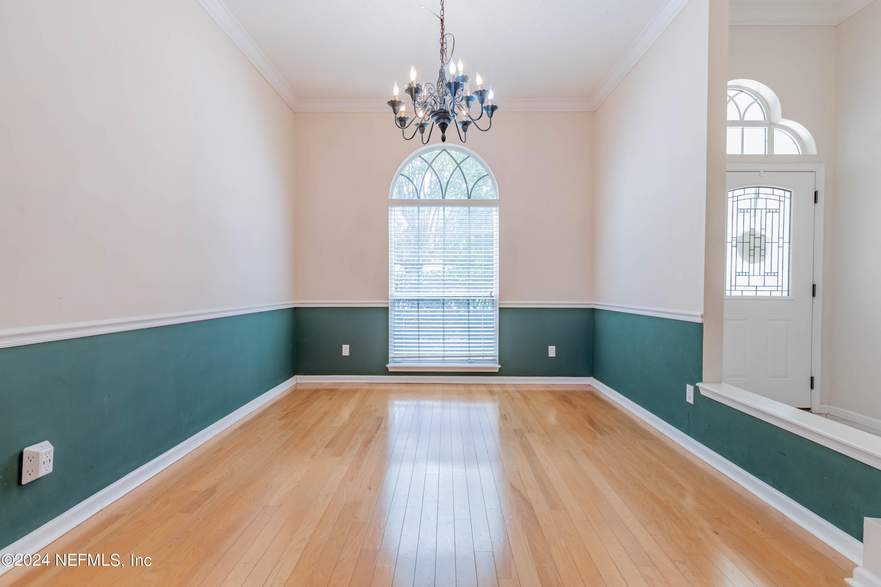 2285 Eagle Harbor Parkway Fleming Island, FL 32003 - Photo 4 of 59 a bedroom with a bed and a window