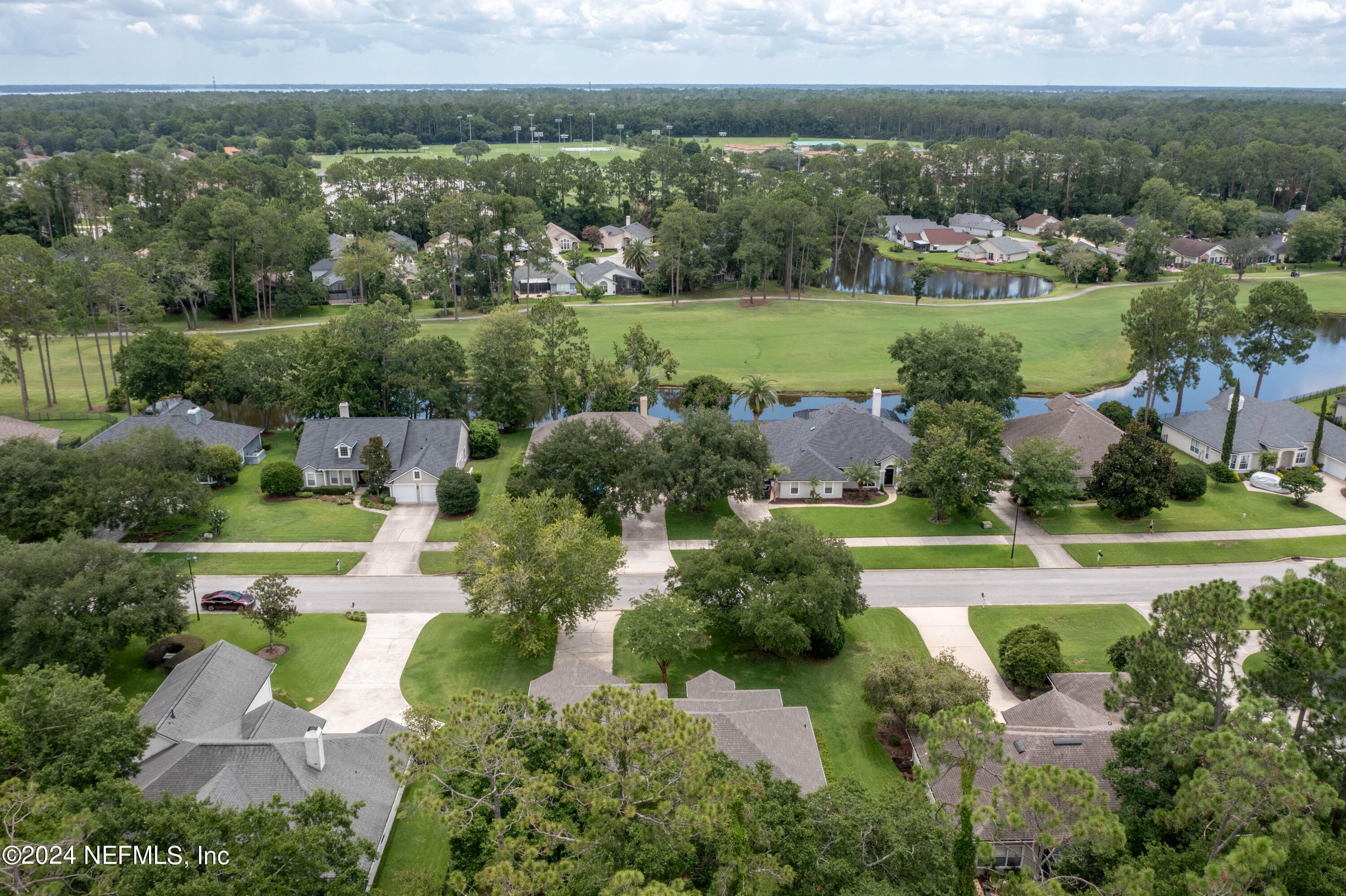 2285 Eagle Harbor Parkway Fleming Island, FL 32003 - Photo 57 of 59 an aerial view of a house with a garden