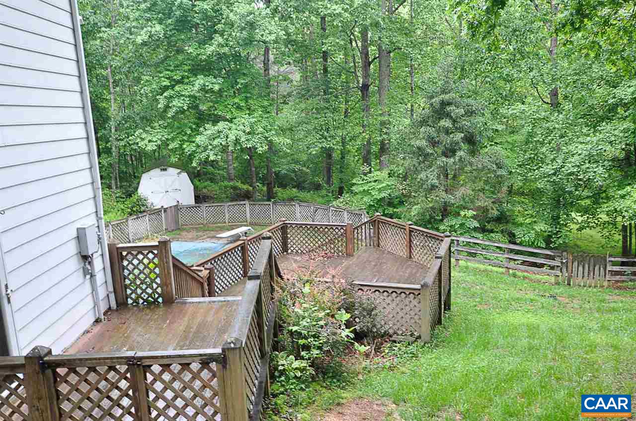 4402 Dickerson Road Charlottesville, VA 22911 - Photo 42 of 42 a view of a wooden deck and bench