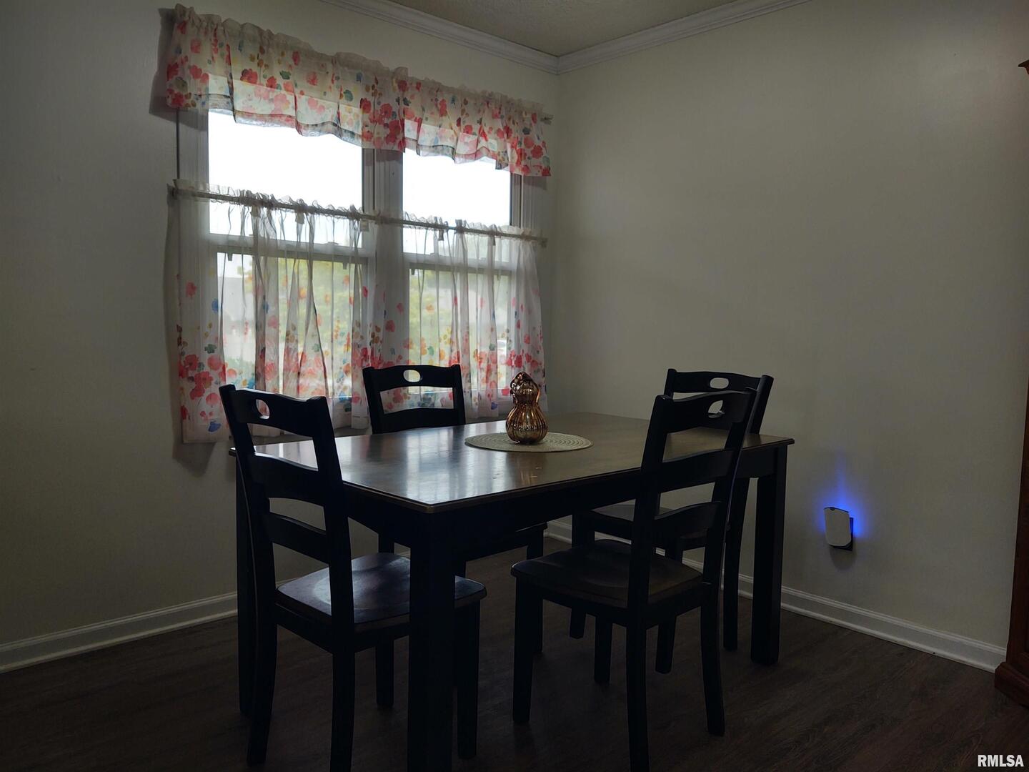 110 Stork Street Anna, IL 62906 - Photo 11 of 27 a view of a dining room with a table and chairs