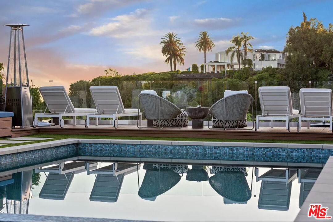 1429 Devlin Drive Los Angeles, CA 90069 - Photo 11 of 58 a view of swimming pool with outdoor seating and city view