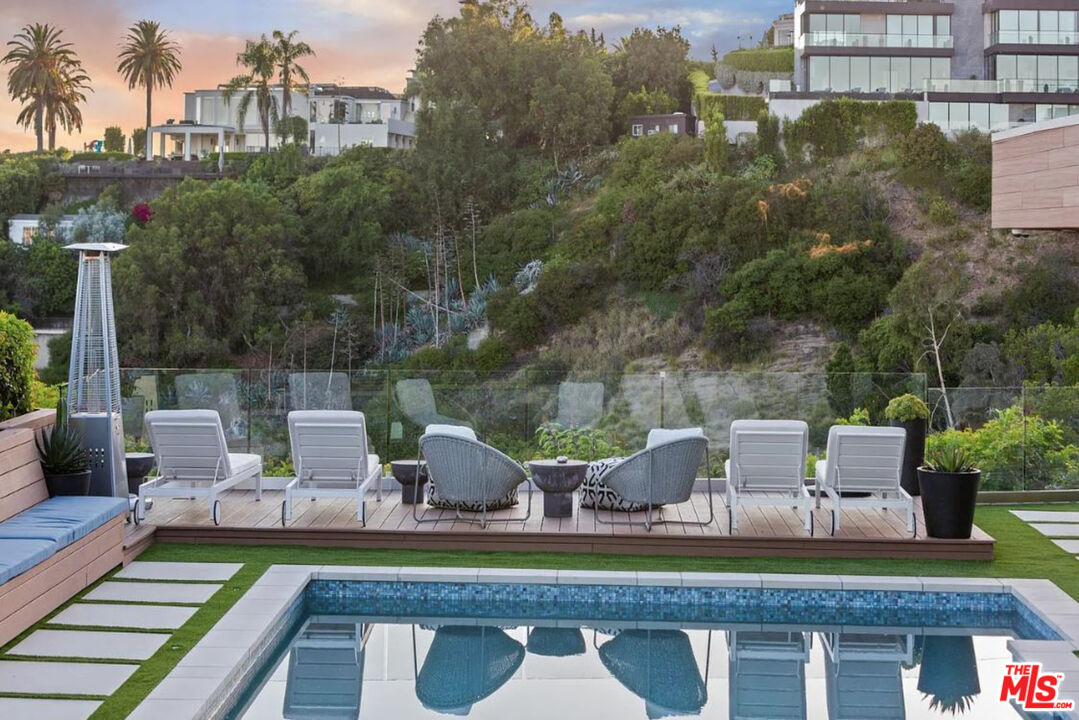 1429 Devlin Drive Los Angeles, CA 90069 - Photo 12 of 58 a view of a patio with lawn chairs