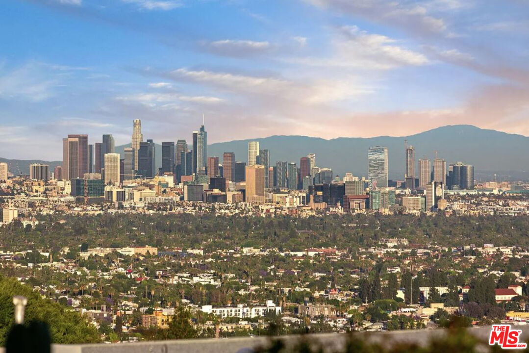 1429 Devlin Drive Los Angeles, CA 90069 - Photo 17 of 58 a view of a city with tall buildings