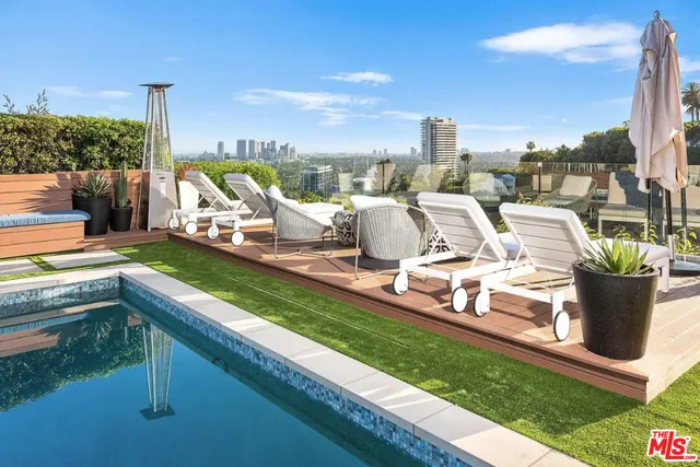 a view of a terrace with wooden floor and outdoor space