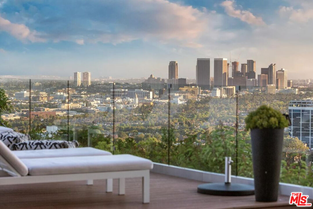 1429 Devlin Drive Los Angeles, CA 90069 - Photo 25 of 58 a view of a city from a terrace