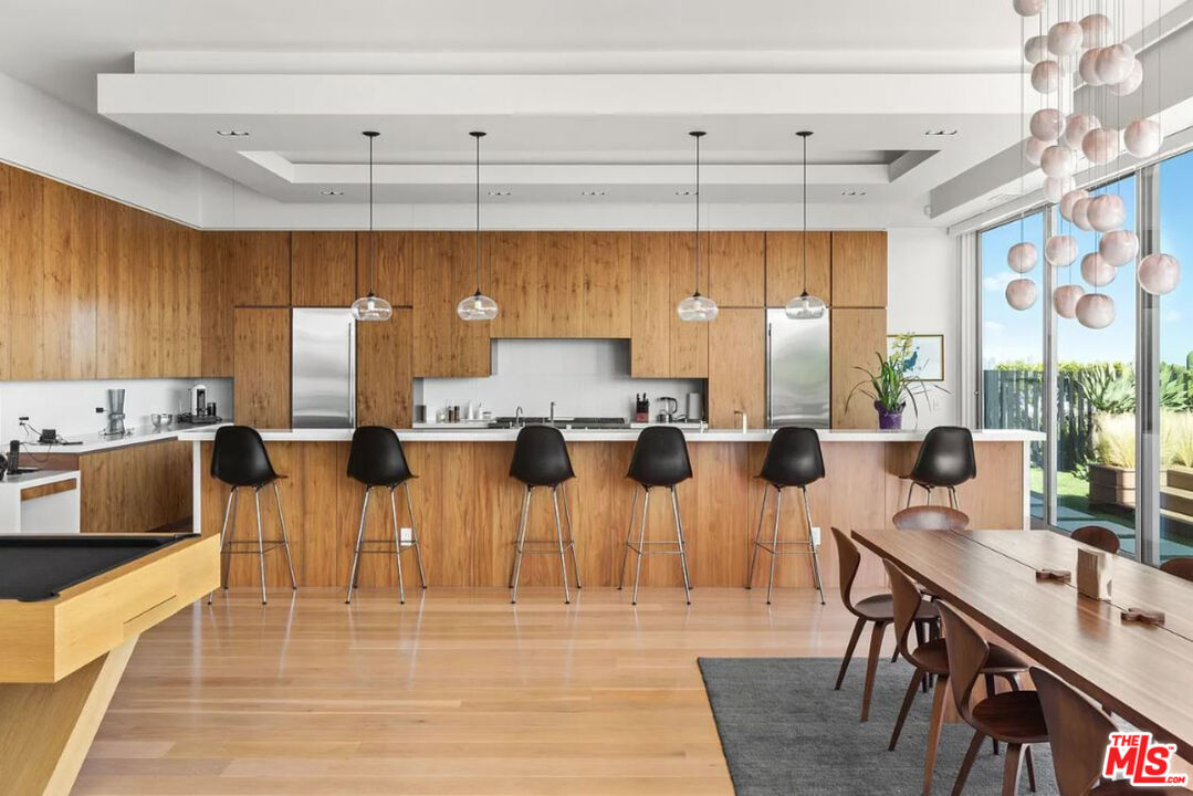 1429 Devlin Drive Los Angeles, CA 90069 - Photo 26 of 58 a kitchen with lots of counter space and furniture
