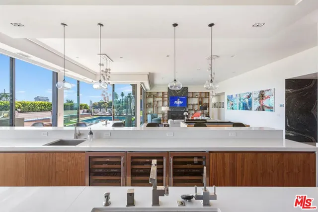 a view of a swimming pool with a lounge chairs
