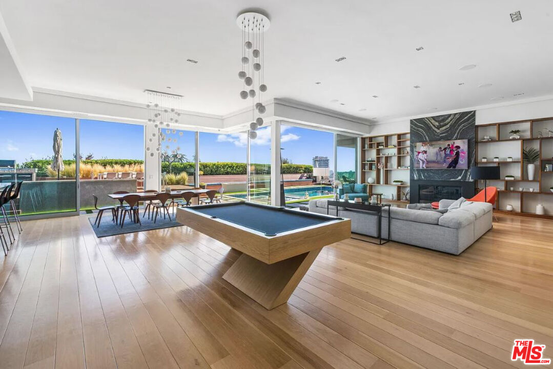 1429 Devlin Drive Los Angeles, CA 90069 - Photo 40 of 58 a living room with furniture and a pool table