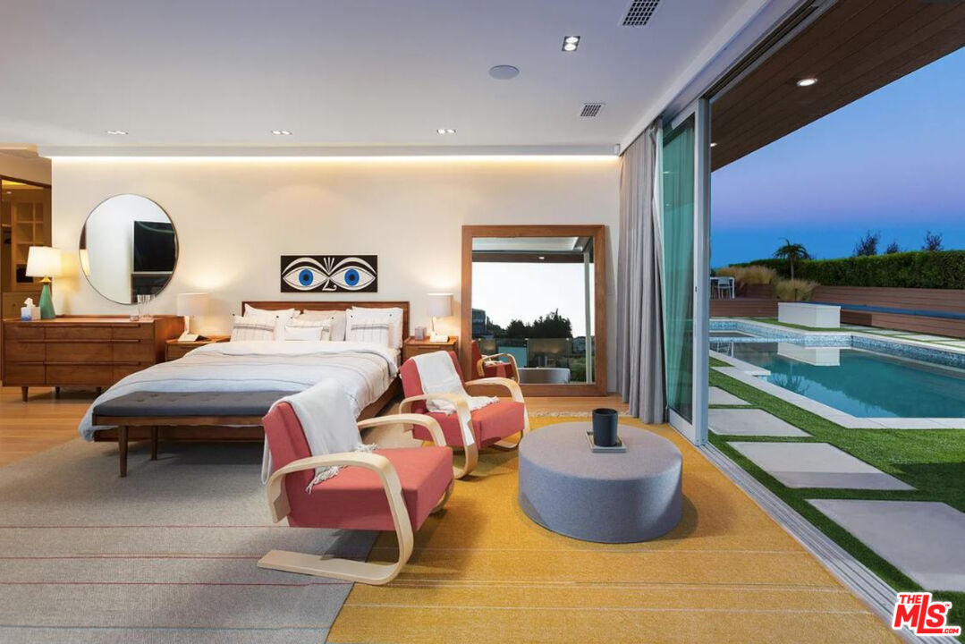 1429 Devlin Drive Los Angeles, CA 90069 - Photo 58 of 58 a bedroom with furniture and a large window