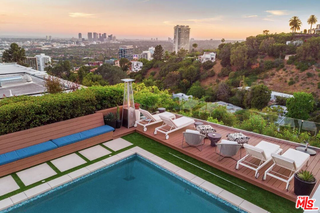 1429 Devlin Drive Los Angeles, CA 90069 - Photo 7 of 58 a view of city from balcony with furniture