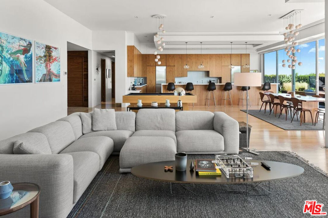 1429 Devlin Drive Los Angeles, CA 90069 - Photo 8 of 58 a living room with furniture and a large window