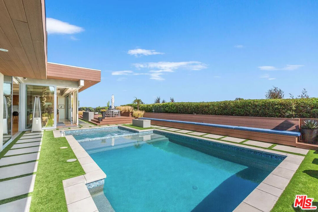 1429 Devlin Drive Los Angeles, CA 90069 - Photo 9 of 58 a view of swimming pool with lounge chair