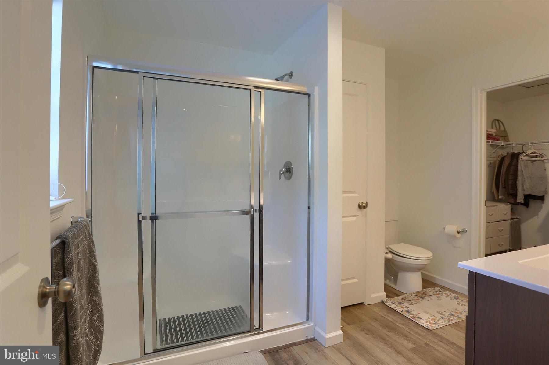 110 Emma Circle Harrisburg, PA 17112 - Photo 16 of 32 a bathroom with a granite countertop sink toilet and shower