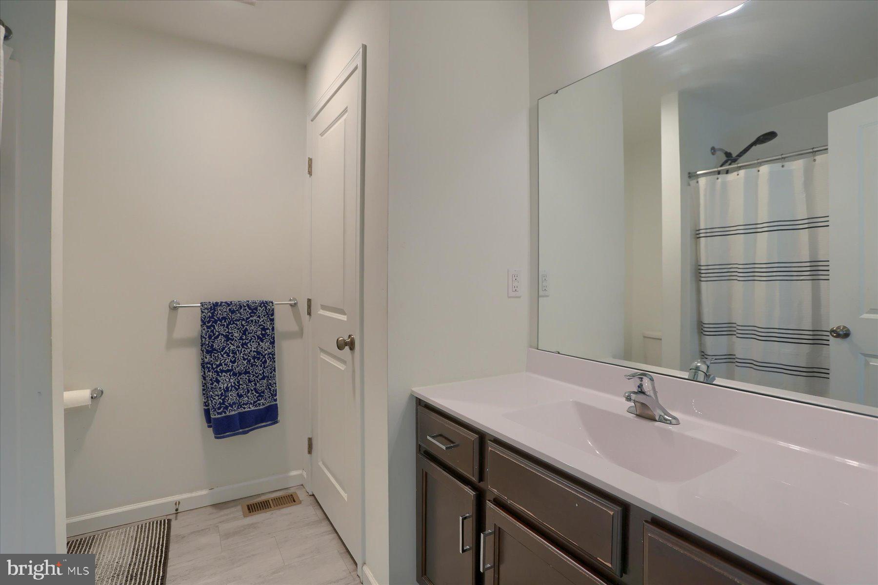 110 Emma Circle Harrisburg, PA 17112 - Photo 21 of 32 a bathroom with a sink and a mirror