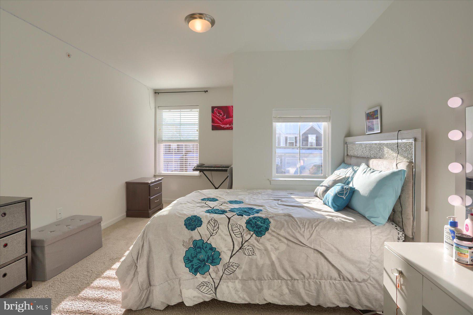 110 Emma Circle Harrisburg, PA 17112 - Photo 22 of 32 a bedroom with a bed and wooden floor