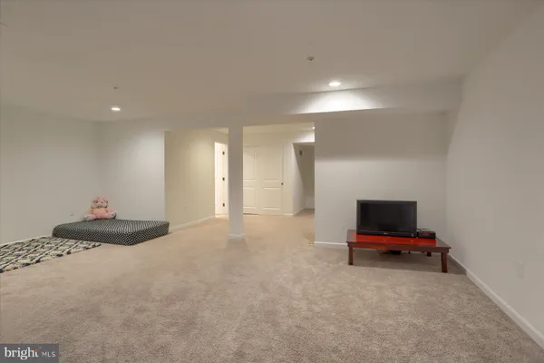 a view of room with gym equipment