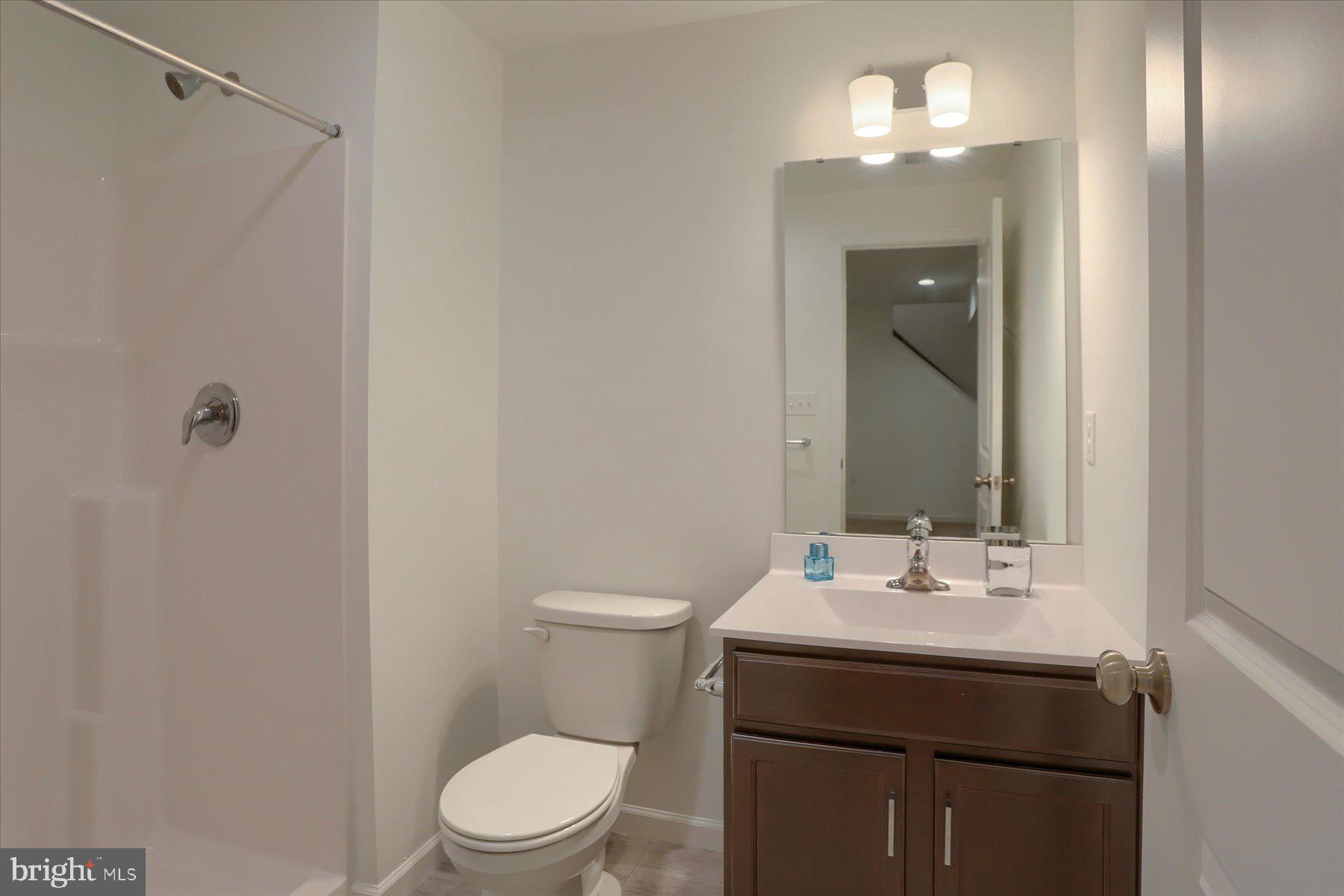 110 Emma Circle Harrisburg, PA 17112 - Photo 30 of 32 a bathroom with a sink vanity and toilet