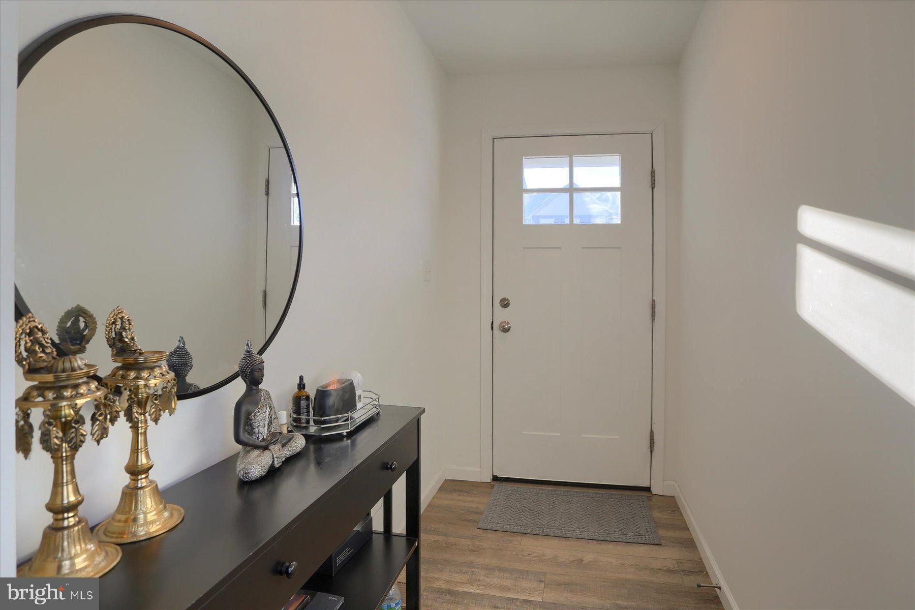 110 Emma Circle Harrisburg, PA 17112 - Photo 4 of 32 a view of a workspace room with wooden floor and dining table