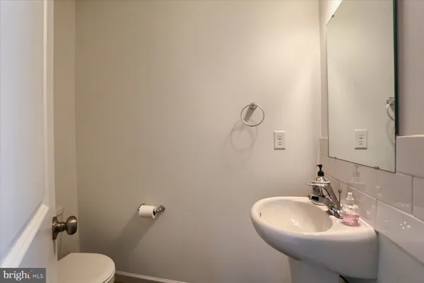 a bathroom with a sink and a toilet