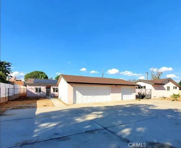 a view of a swimming pool and an outdoor space